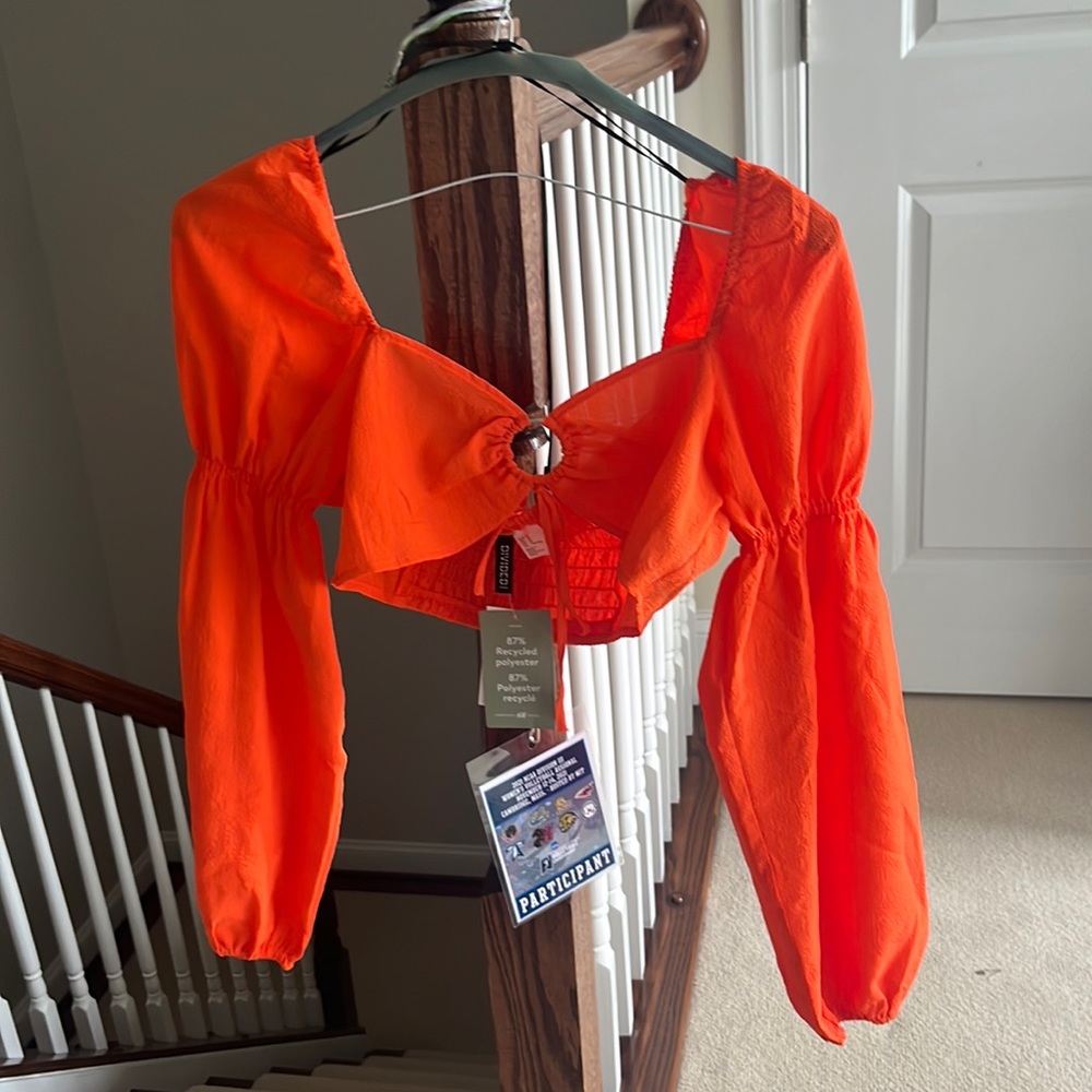 Bright orange long sleeve crop top